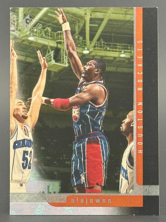 Hakeem Olajuwon 1993-94 SP basketball card shooting over defenders.