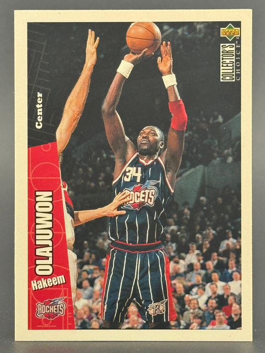 Hakeem Olajuwon basketball trading card, 1990s Upper Deck Collector's Choice, showing him shooting a jump shot.