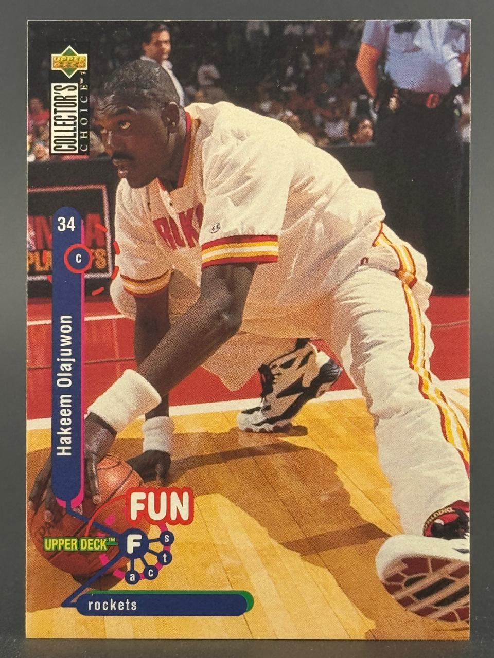 1994-95 Upper Deck Collector's Choice Hakeem Olajuwon basketball card #34.
