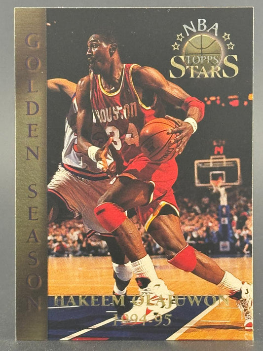 1994-95 NBA Topps Stars Hakeem Olajuwon basketball trading card.
