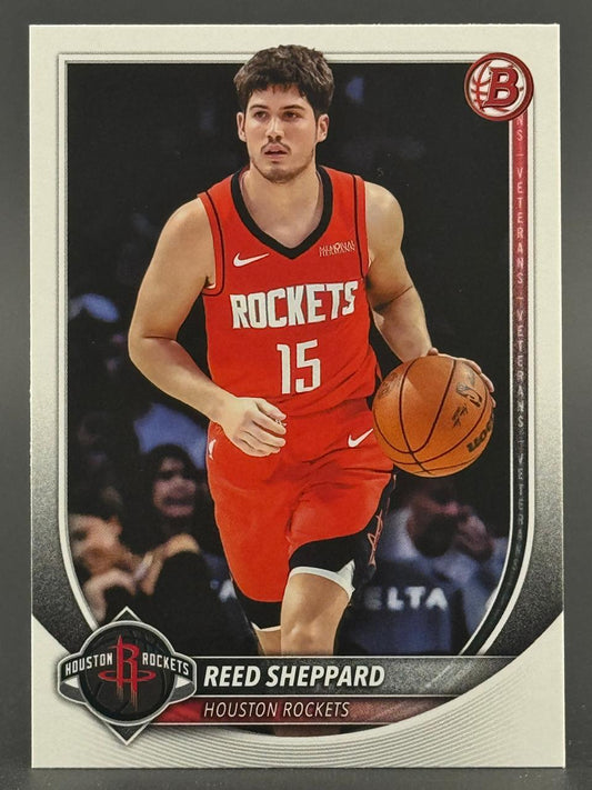 Trading card of Reed Sheppard, Houston Rockets, #15, dribbling a basketball.
