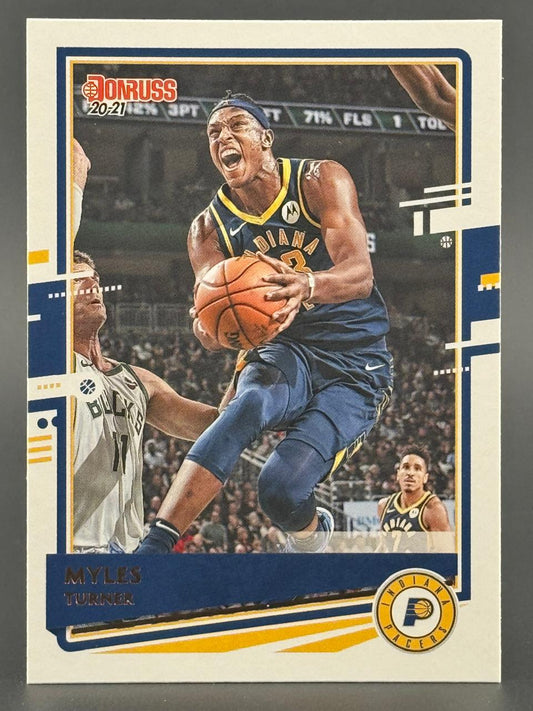 20-21 Donruss Myles Turner basketball card featuring Turner holding a basketball in game action.