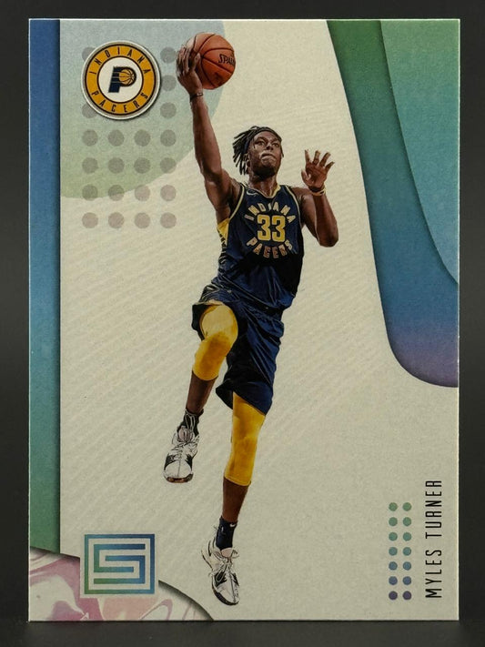 Trading card of Myles Turner dunking in a blue and yellow Indiana Pacers uniform, with abstract green and blue design.