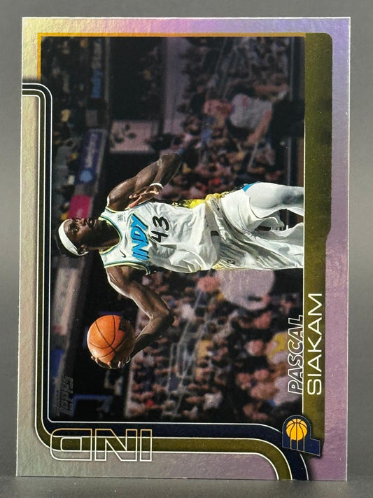 Pascal Siakam basketball card featuring a white Indiana Pacers jersey and dribbling a basketball.
