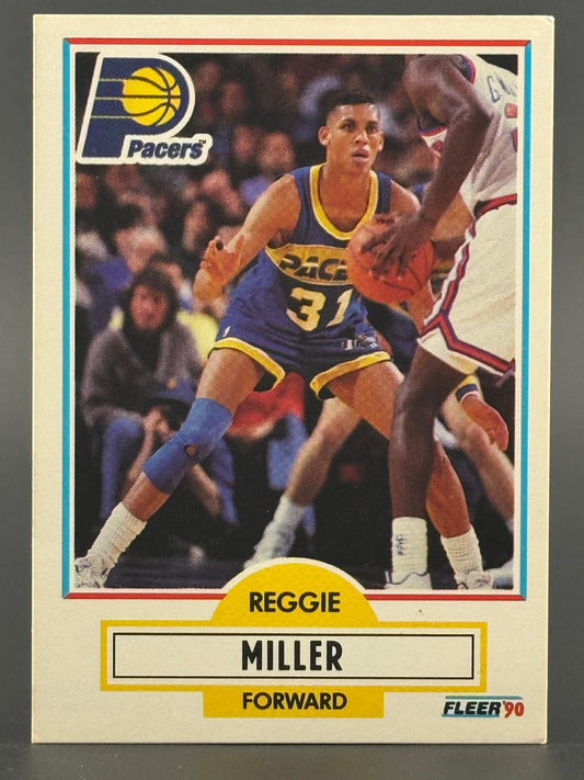 1990 Fleer Reggie Miller Pacers trading card #90 showing him dribbling against an opponent.