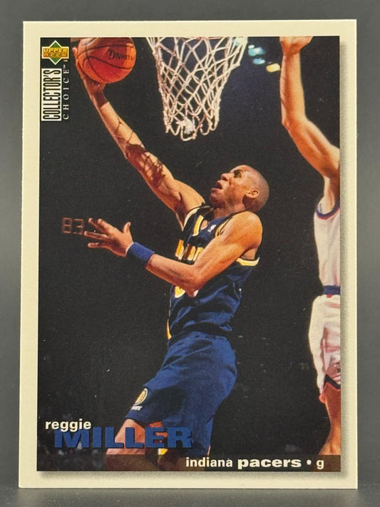 1990s Reggie Miller Upper Deck Collector's Choice basketball card, showing him driving and laying up.