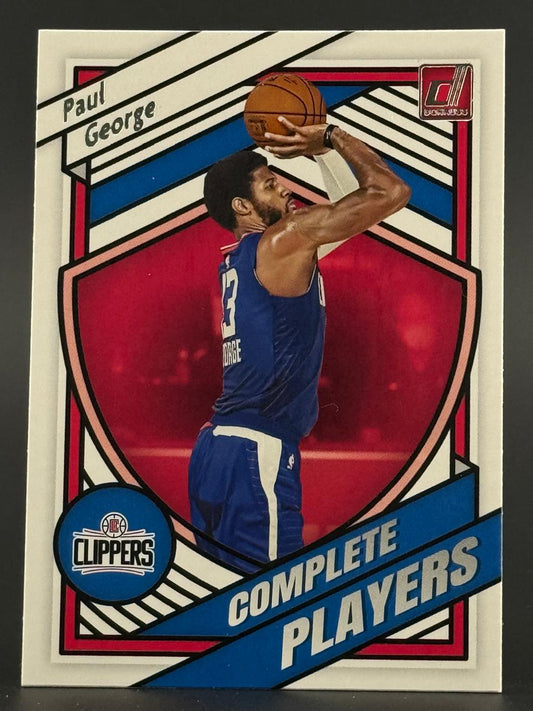 Paul George Donruss Complete Players basketball card, shooting a jump shot in a blue Clippers uniform.