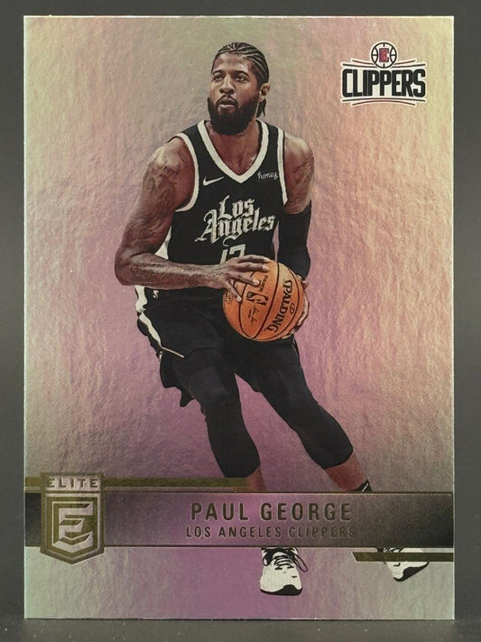 Paul George basketball trading card in a Clippers uniform holding a ball, from the Elite set.