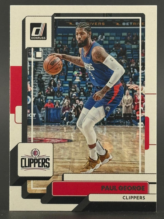 Paul George Clippers trading card, Donruss brand, showing him dribbling on the court.