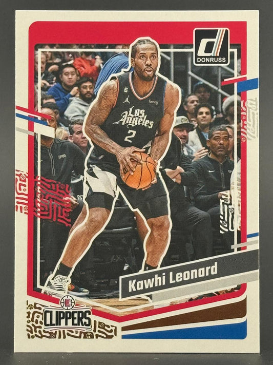 Kawhi Leonard 2022-23 Donruss basketball card featuring him in a Clippers jersey holding a basketball.