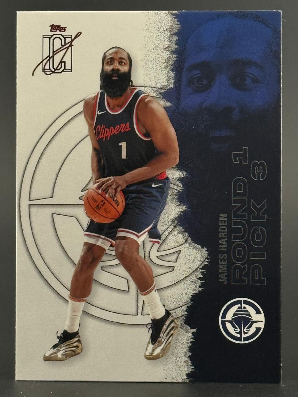 James Harden 2024-25 Topps basketball card holding a ball in Clippers uniform.