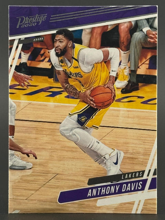 2020 Prestige Anthony Davis trading card featuring Davis in a Lakers uniform holding a basketball.