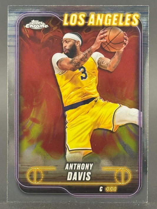 Anthony Davis 2024 Topps Chrome Los Angeles trading card holding a basketball.