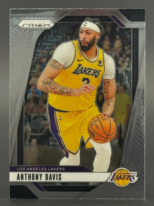 Anthony Davis 2021-22 Panini Prizm trading card in Lakers uniform dribbling basketball.