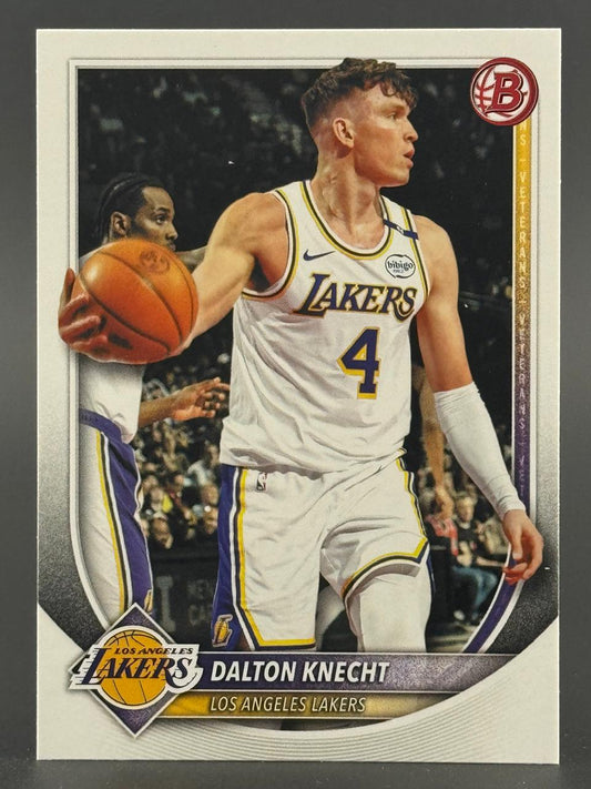 Trading card of Dalton Knecht in a white Los Angeles Lakers uniform, holding a basketball.