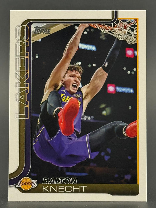 Trading card of Dalton Knecht in a Lakers uniform dunking a basketball.