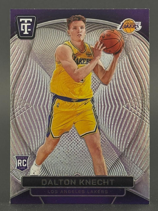 Dalton Knecht 2024 Panini Impeccable rookie card holding a basketball in a Lakers uniform.