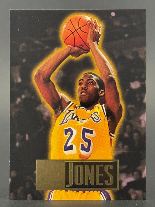 Trading card featuring Lakers player Eddie Jones in a yellow jersey, number 25, shooting a basketball.