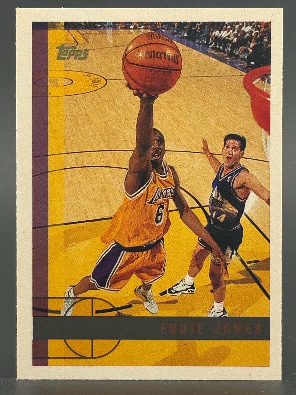 Eddie Jones Topps basketball card, driving to the basket with a defender nearby.