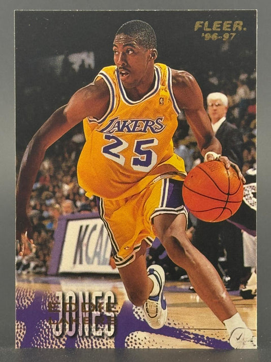 1996-97 Fleer Eddie Jones basketball card, #25, showing Jones dribbling in a Lakers uniform.