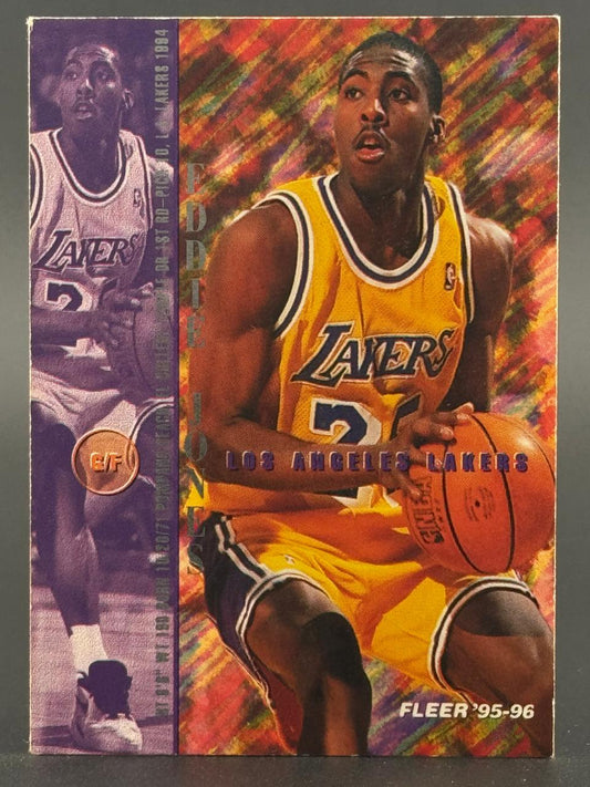 1995-96 Fleer Eddie Jones basketball card featuring Jones in a Los Angeles Lakers uniform holding a basketball.