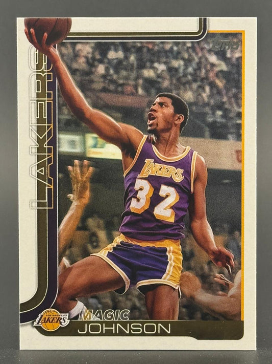 Magic Johnson trading card, Topps, showing him in a Lakers jersey with number 32 shooting a basketball.