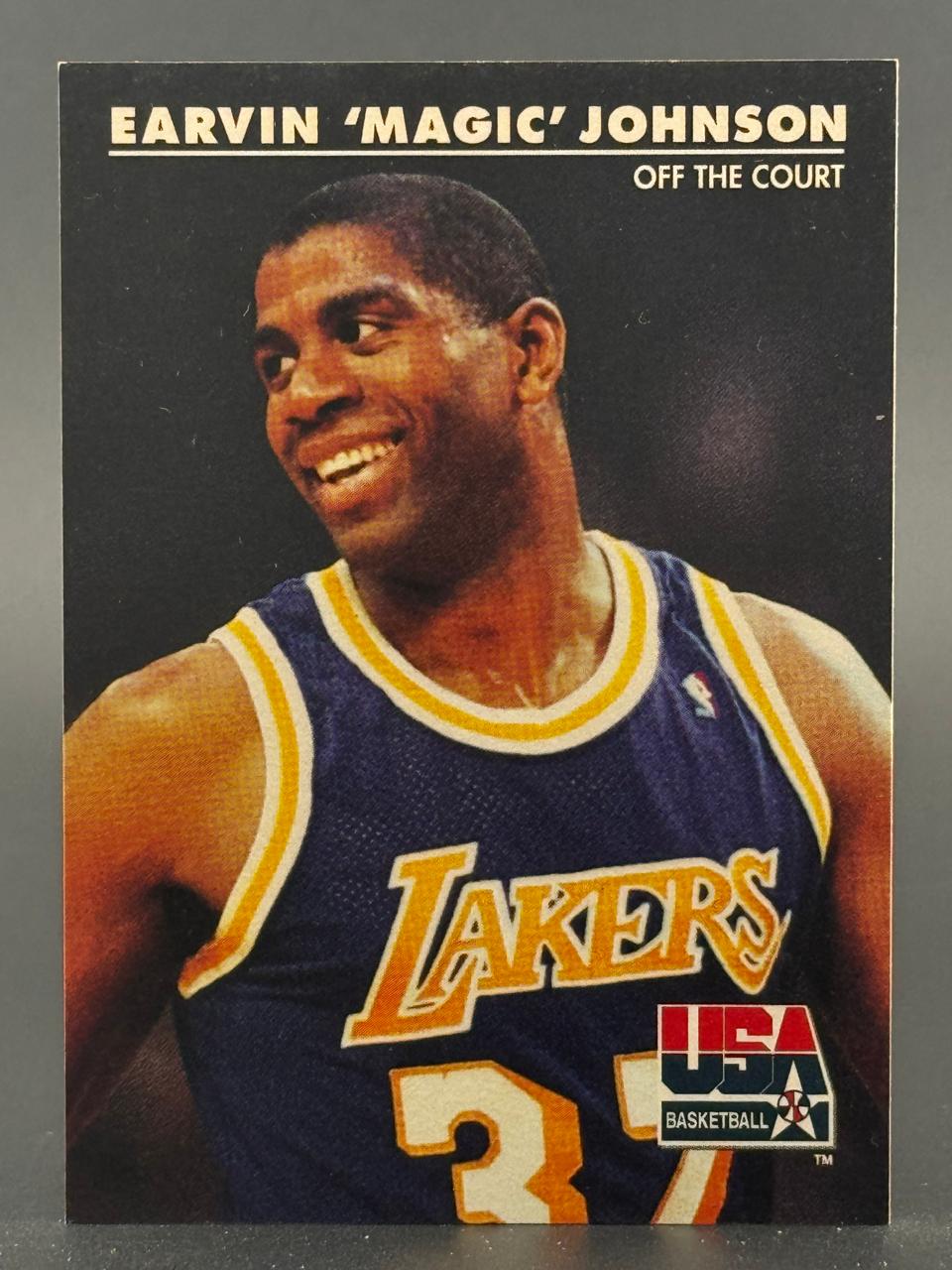 Earvin "Magic" Johnson trading card, "Off the Court" series, showing him in a Lakers jersey.
