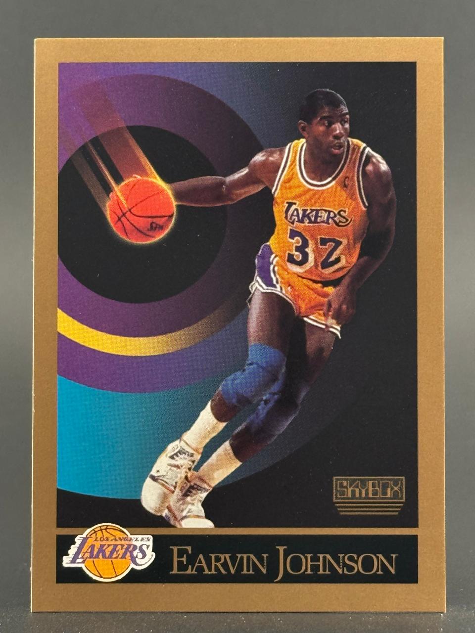 1990-91 SkyBox Earvin Johnson basketball card #27.