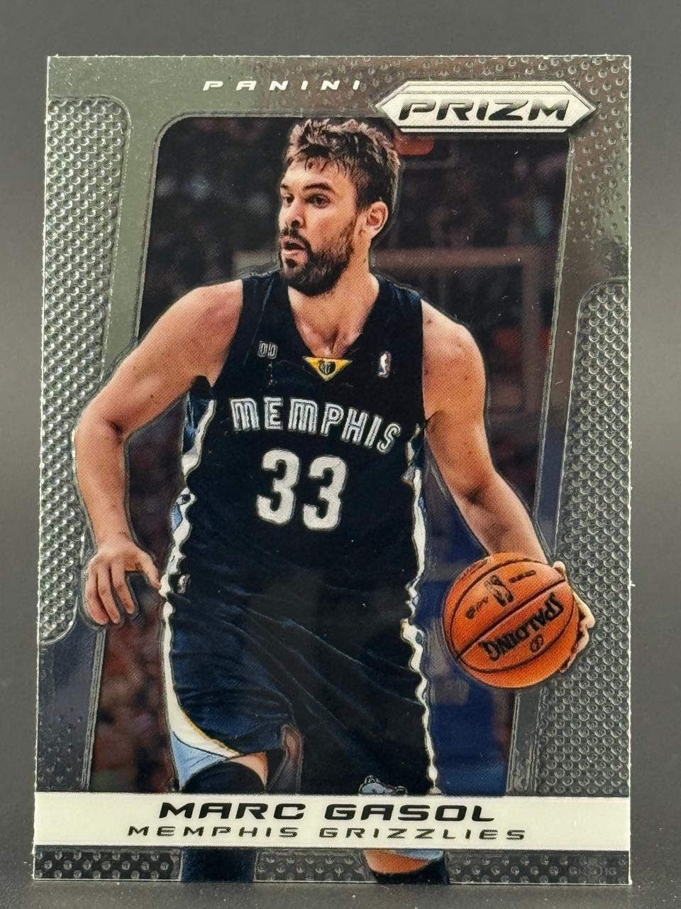 Marc Gasol 2012-13 Panini Prizm trading card, number 136, showing him dribbling in a Memphis Grizzlies uniform.