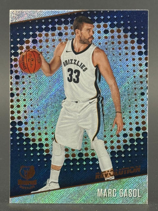 Marc Gasol basketball card with blue holographic dot background, wearing a Memphis Grizzlies uniform with number 33.