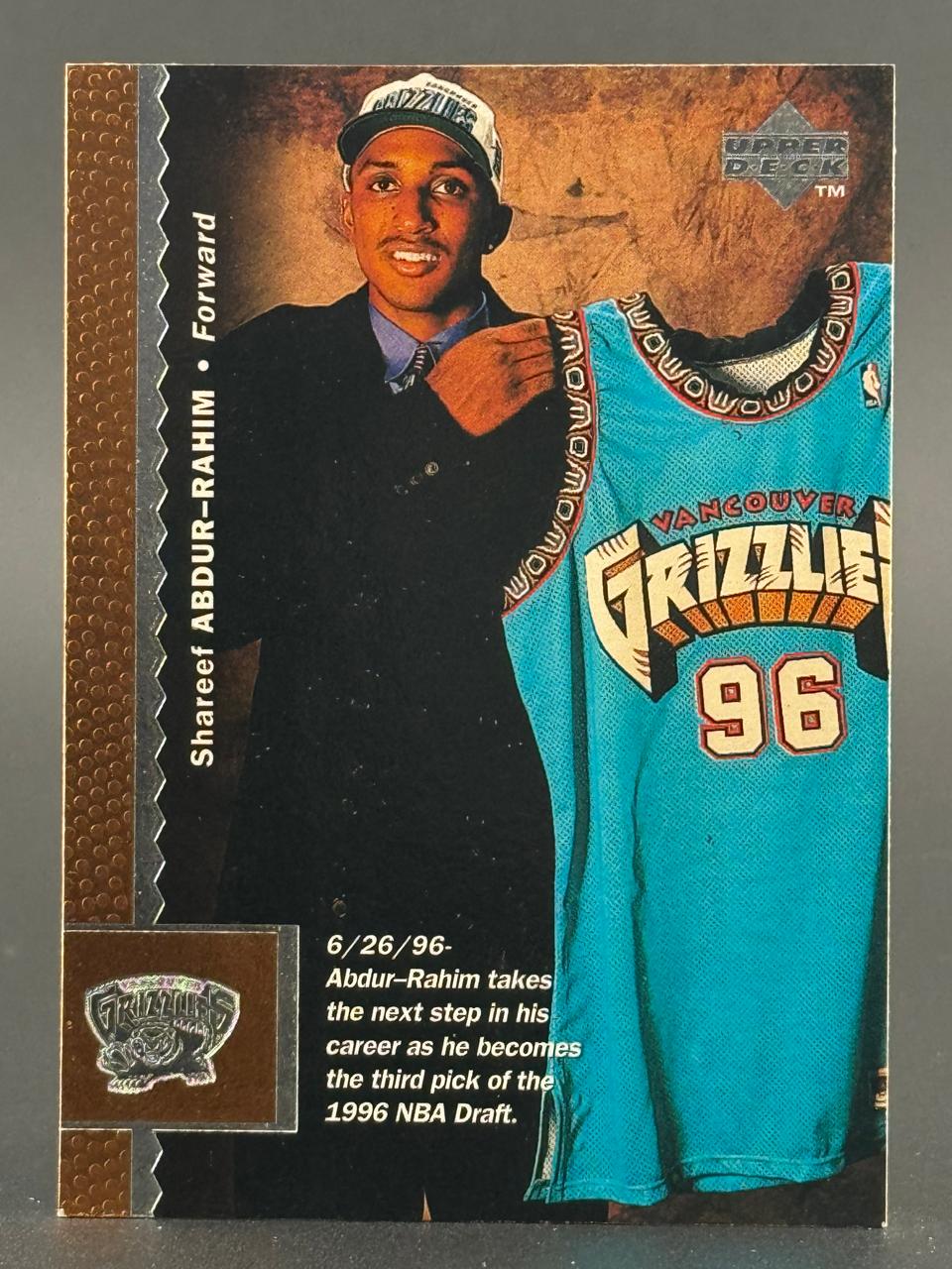 Shareef Abdur-Rahim 1996 Upper Deck basketball card holding a Vancouver Grizzlies jersey.