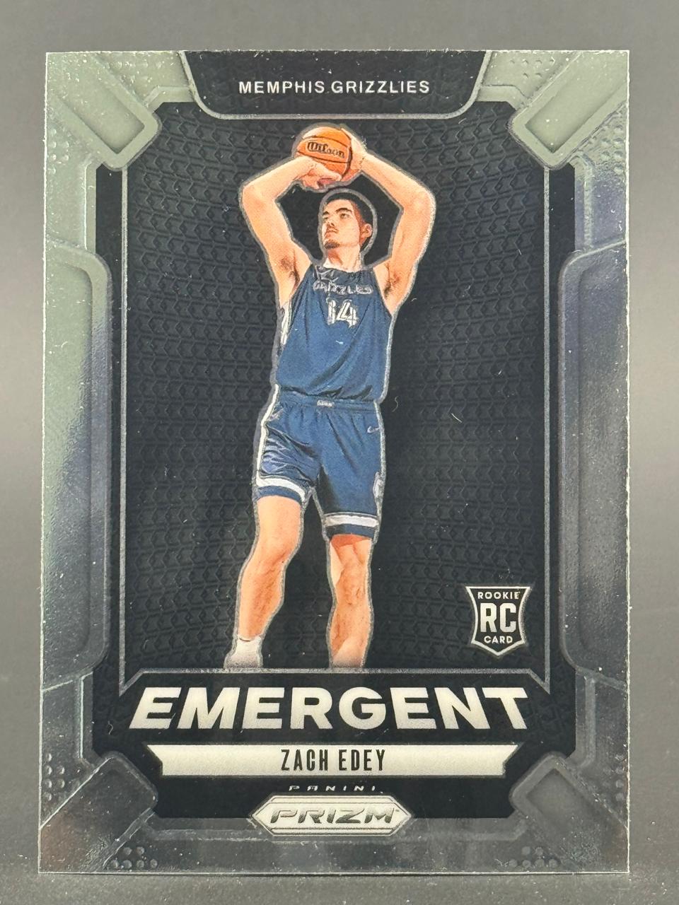 Zach Edey 2024 Panini Prizm Emergent rookie card featuring him in a Grizzlies uniform shooting a basketball.