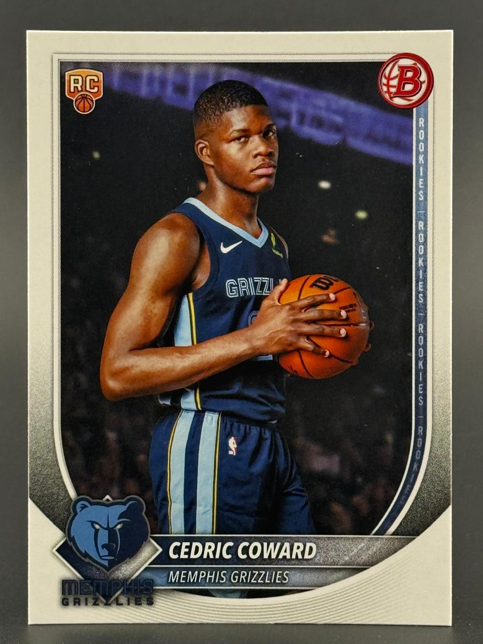 Cedric Coward trading card, Memphis Grizzlies, holding a basketball.