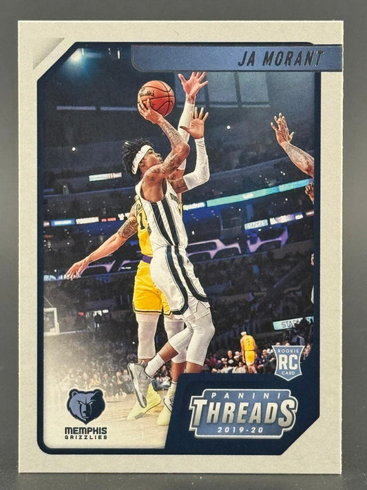 2019-20 Panini Threads Ja Morant rookie card, #1, featuring him driving to the basket in a Memphis Grizzlies uniform.