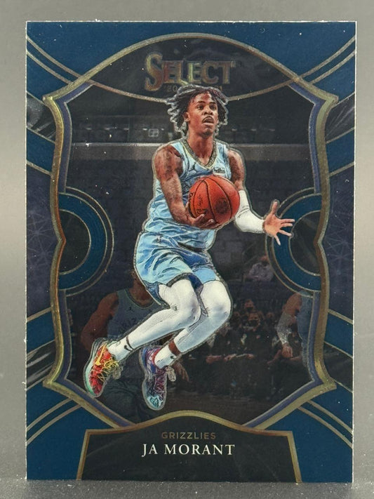 2020-21 Panini Select Ja Morant basketball card, showing him dribbling in a blue Grizzlies uniform.