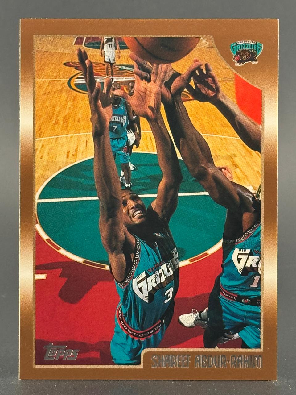 Shareef Abdur-Rahim 1996-97 Topps basketball card, #300, showing him reaching for a rebound in a game.