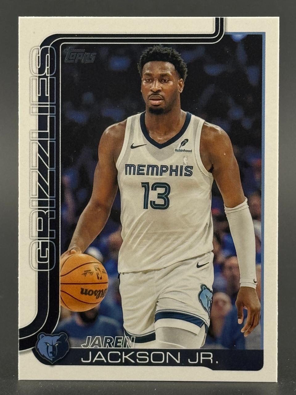 Jaren Jackson Jr. basketball card, featuring the player in a white Memphis Grizzlies uniform dribbling.