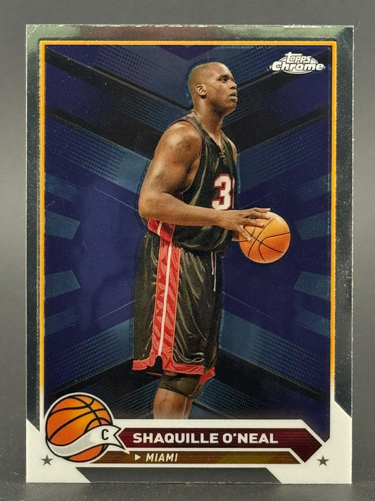 Shaquille O'Neal Topps Chrome basketball card showing him in a Miami jersey holding a basketball.