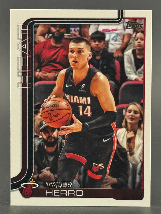 Tyler Herro trading card featuring him in a black Miami Heat uniform holding a basketball.