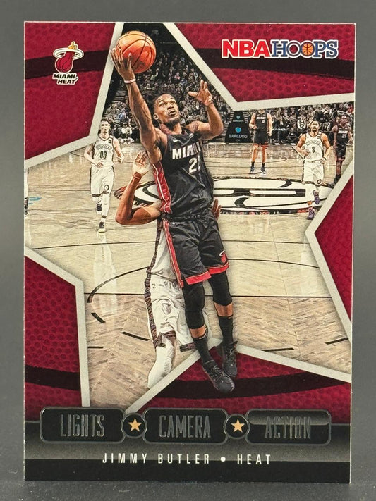 Jimmy Butler NBA Hoops Lights Camera Action trading card, showing him in a Miami Heat uniform shooting.