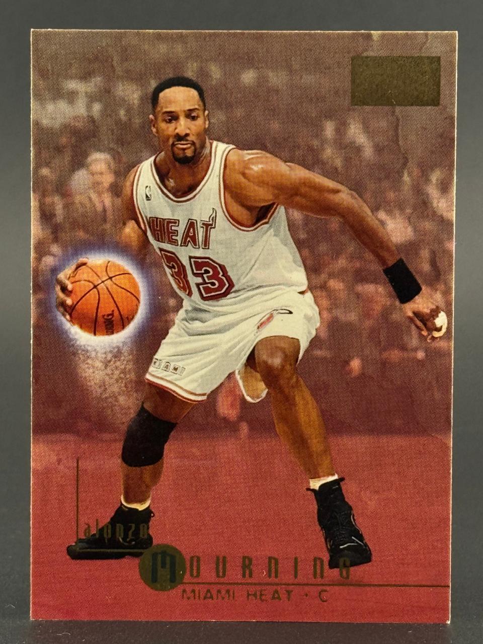 Alonzo Mourning 1993-94 Metal Basketball Card #33 in Miami Heat uniform.
