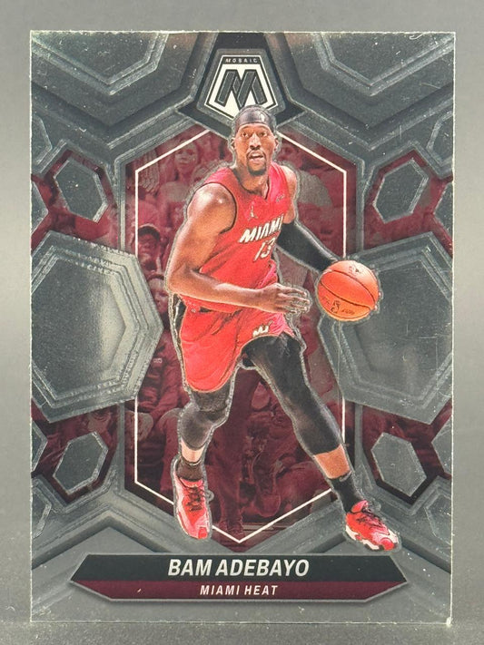Bam Adebayo 2021-22 Panini Mosaic basketball card, showing him dribbling in a Miami Heat uniform.