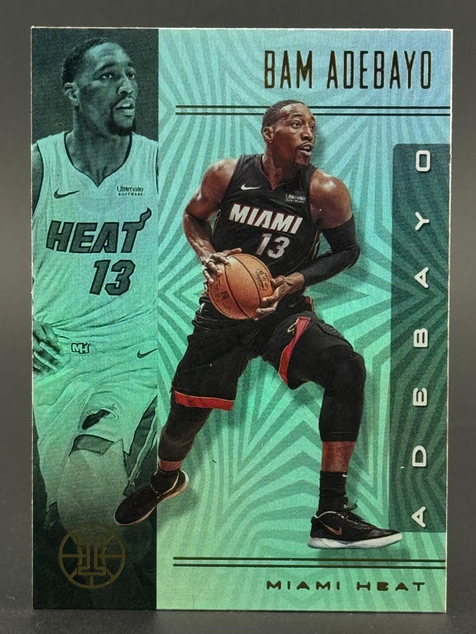 Trading card of Bam Adebayo, Miami Heat, featuring a teal and green geometric patterned background.