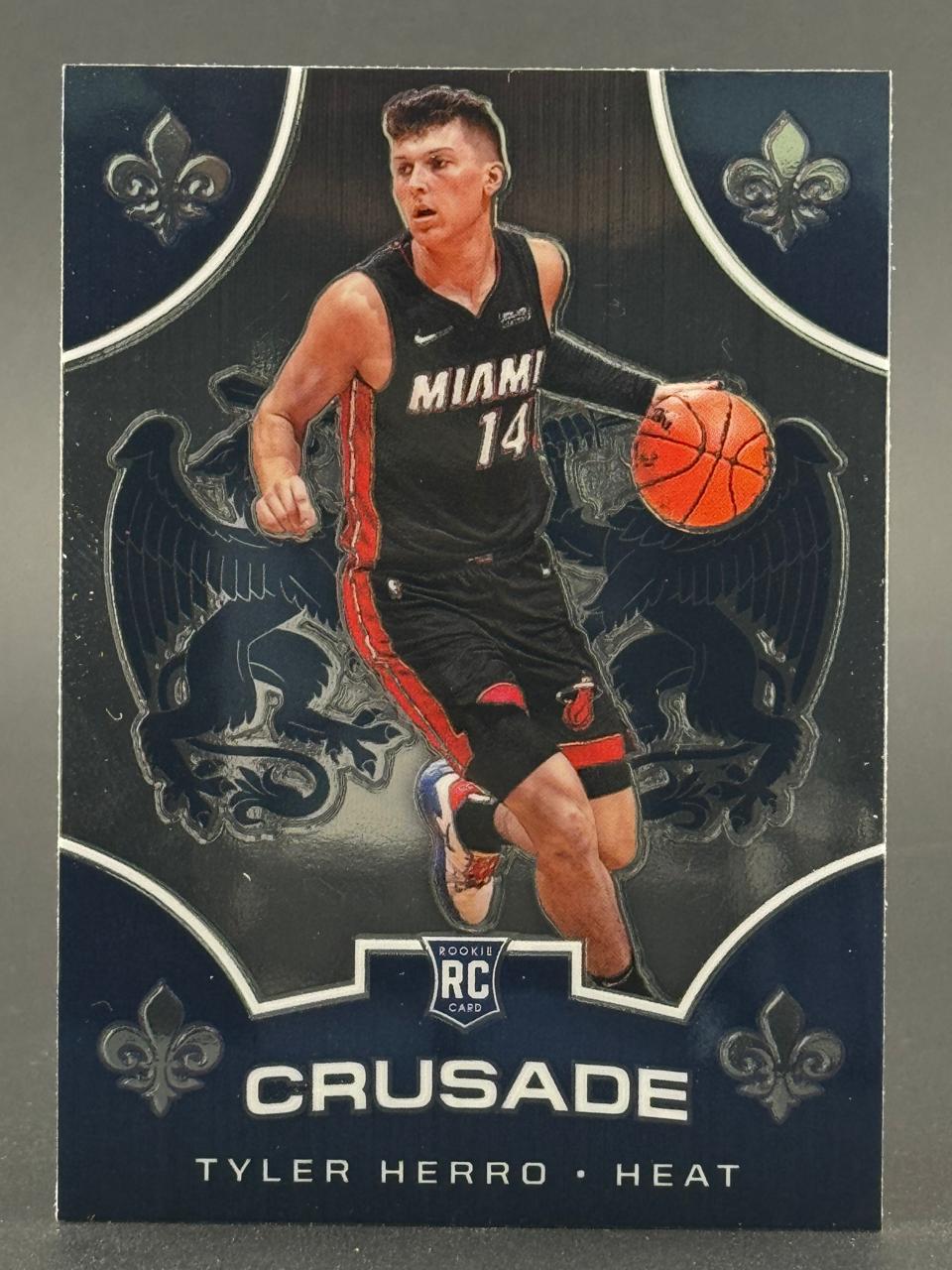 Tyler Herro Crusade basketball card featuring him dribbling in a Miami Heat uniform with a rookie card emblem.