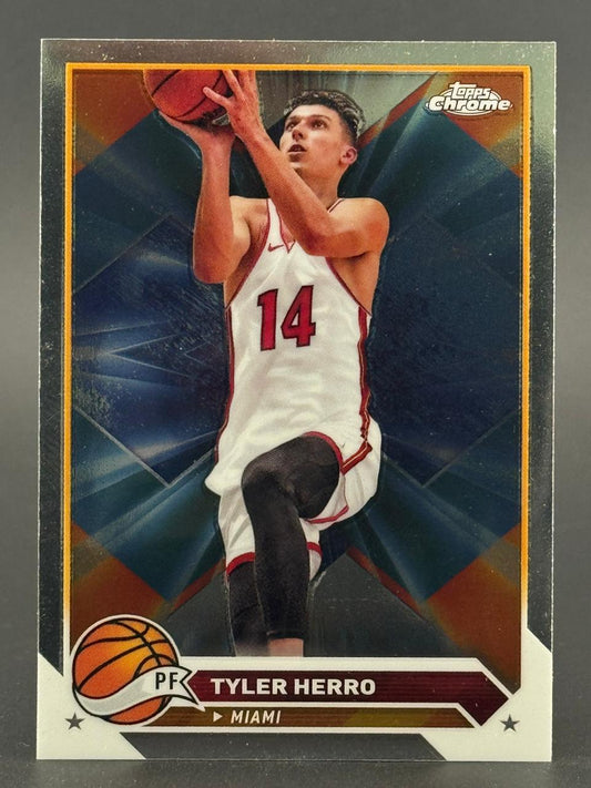 Tyler Herro Miami basketball trading card with Topps Chrome logo, showing him shooting.
