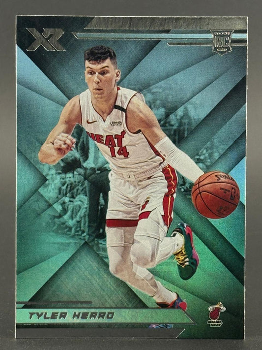 2019-20 Panini XR Tyler Herro rookie card #14 in Miami Heat uniform dribbling a basketball.
