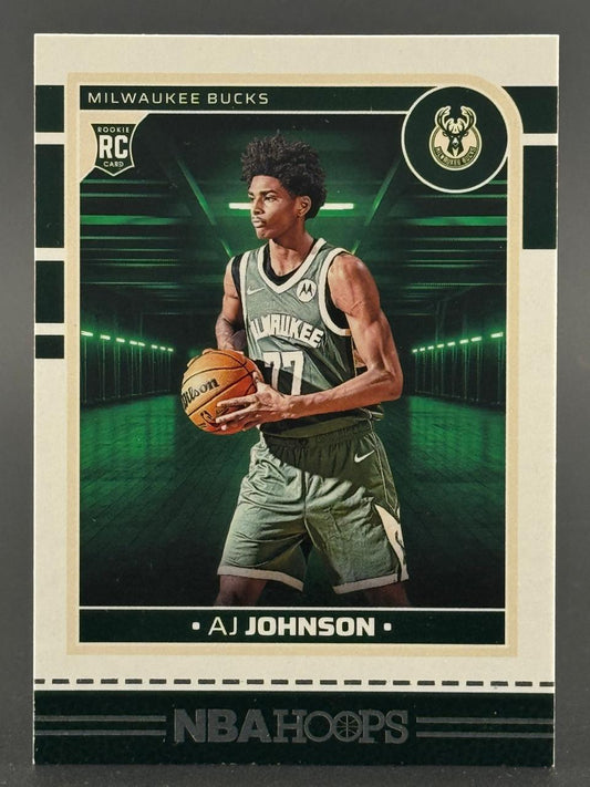 AJ Johnson basketball trading card, NBA Hoops, Milwaukee Bucks, rookie card, holding basketball.