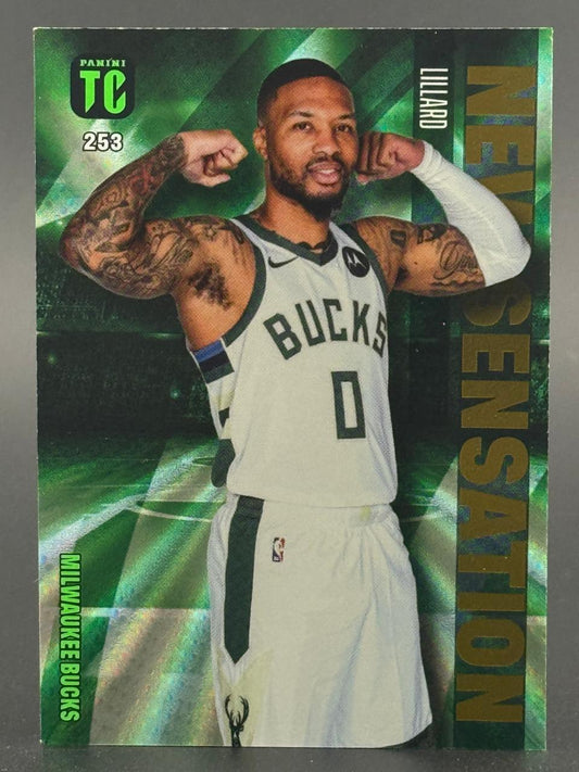 Damian Lillard 2023-24 Panini TC New Sensation trading card #253, showing him flexing in a Bucks jersey.