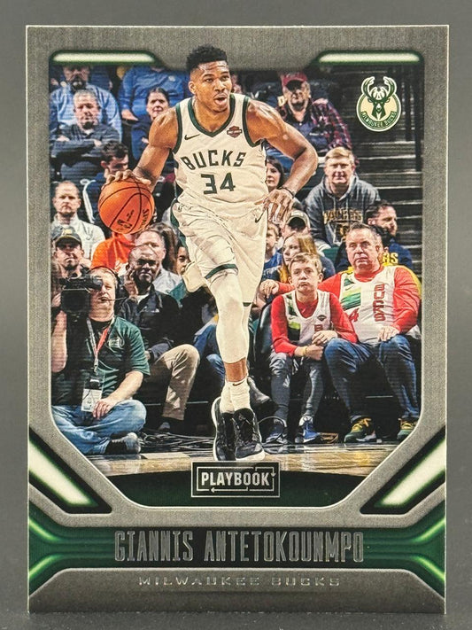 Giannis Antetokounmpo 2020-21 Panini Playbook trading card dribbling basketball.