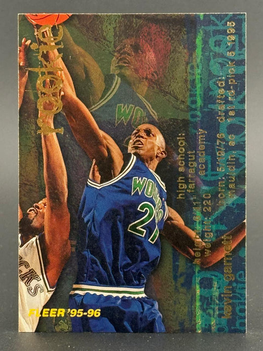 1995-96 Fleer Kevin Garnett rookie basketball card showing him in a Timberwolves uniform.